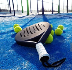Padel racket, Padel balls, and blue Padel court.